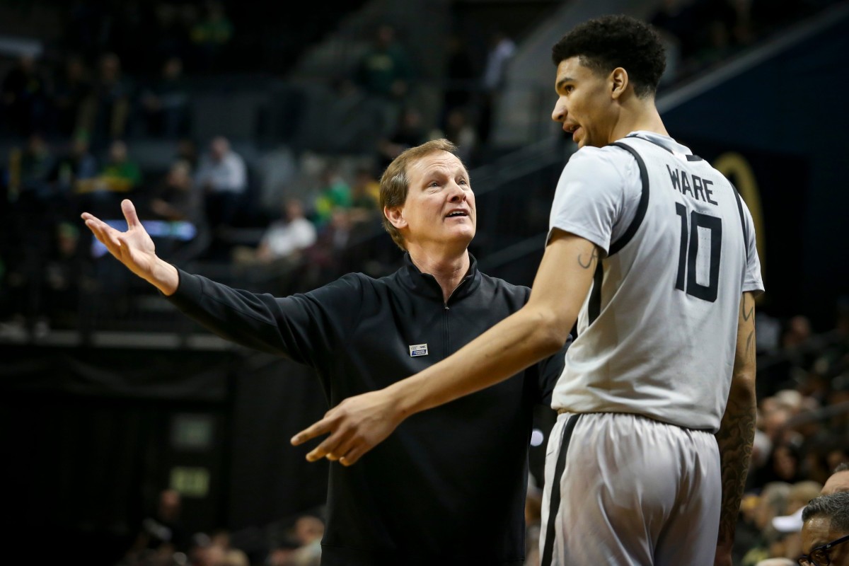 Oregon coach Dana Altman talks to center Kel'el Ware as the Ducks host the Colorado Buffaloes at Matthew Knight Arena in Eugene, Ore. Thursday, Jan. 26, 2023.